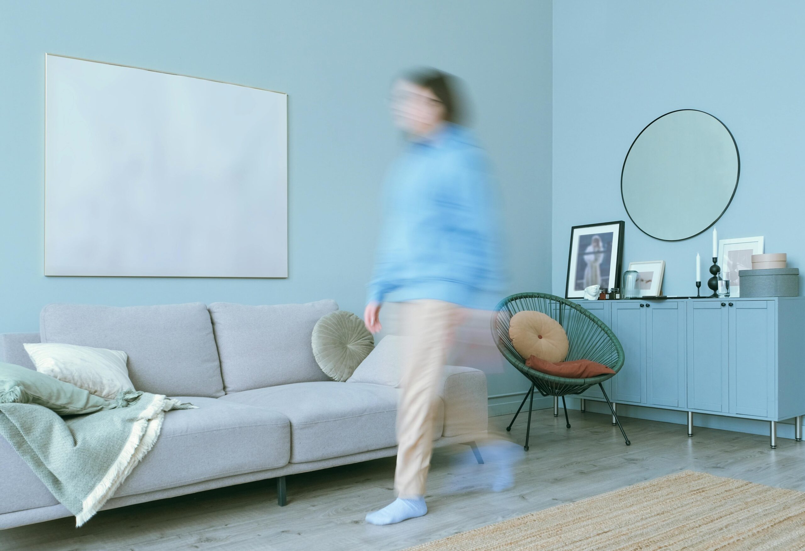 Man in front of curtains 